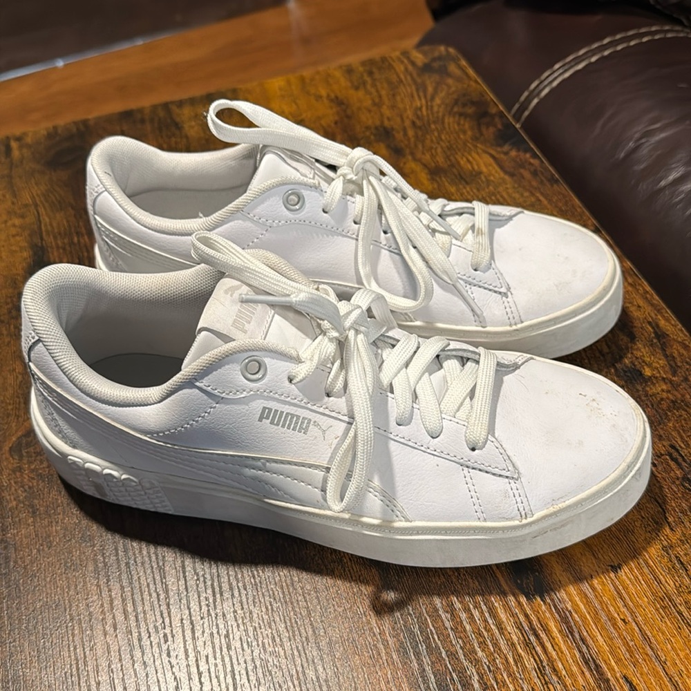 White platform Puma sneakers